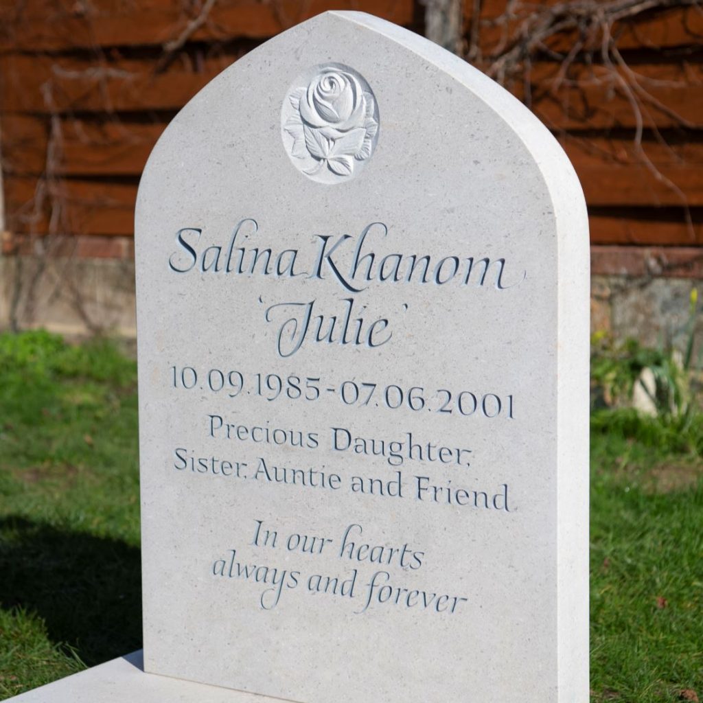 White Headstone with carved letters by skilled stonemason