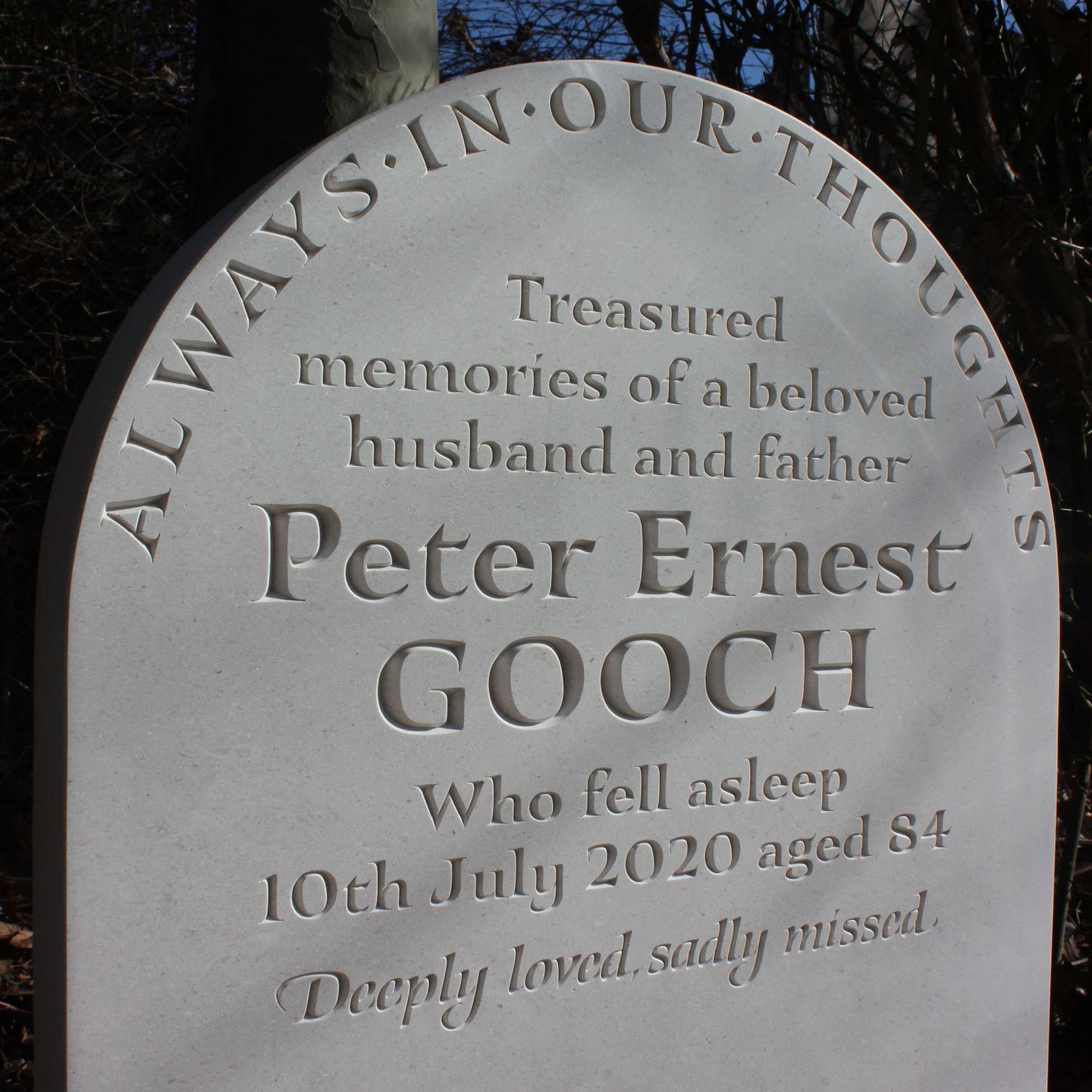 V-carved memorial plaques and headstones and gravestones